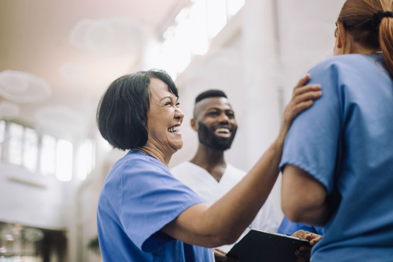 Healthcare Nurses Collaborating in Hospital Setting